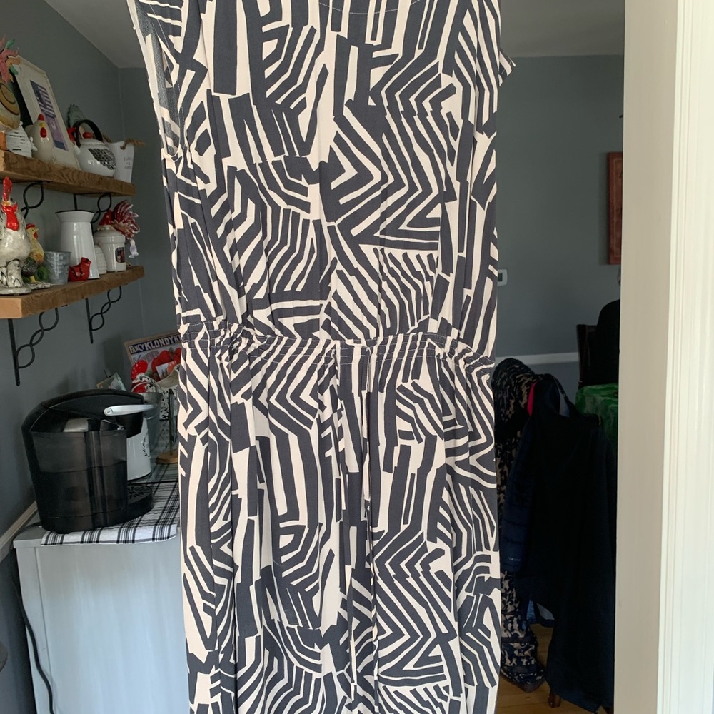 This dress is from the loft. It is charcoal gray with an eggshell background